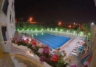 Sunny Land pool resort at night near Zahlé