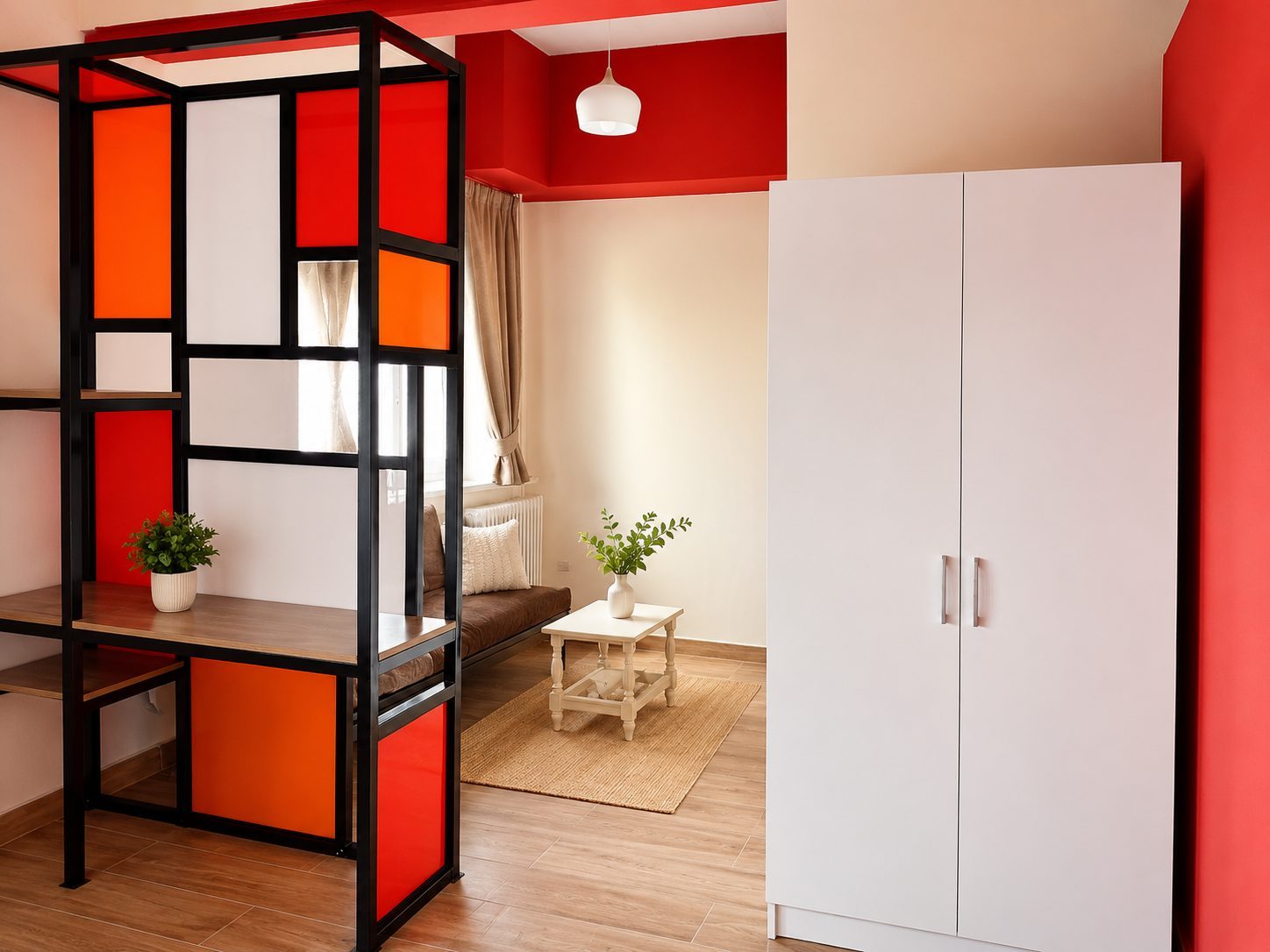 Berdawny Apartments living area with colorful room divider and wardrobe